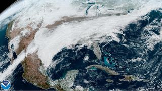 Satellite image showing widening clouds associated with a winter storm.